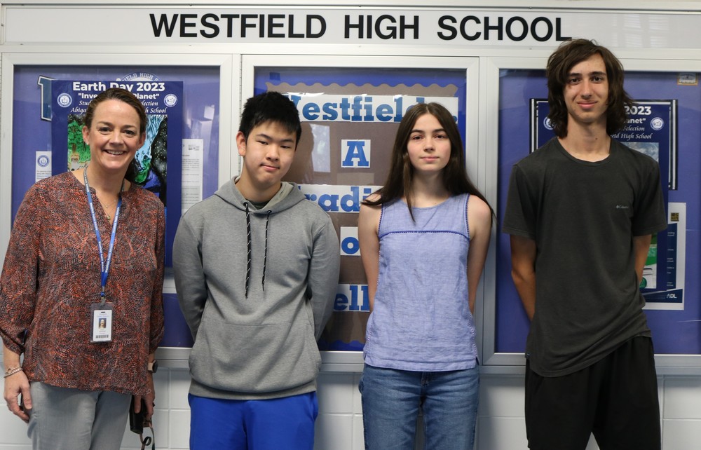 WHS ACT-SAT perfect scorers pose for picture with principal