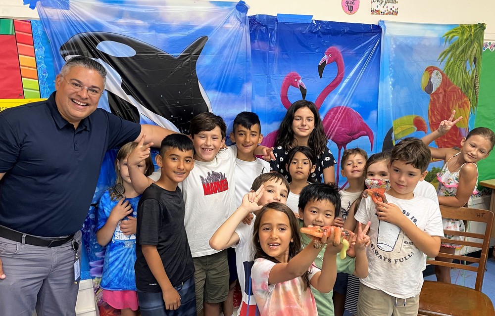 ELL campers pose for a picture with Superintendent Dr. Raymond Gonzalez
