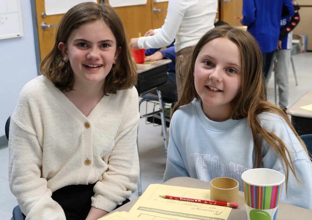Two Franklin 5th graders work together during Pi Day activities.