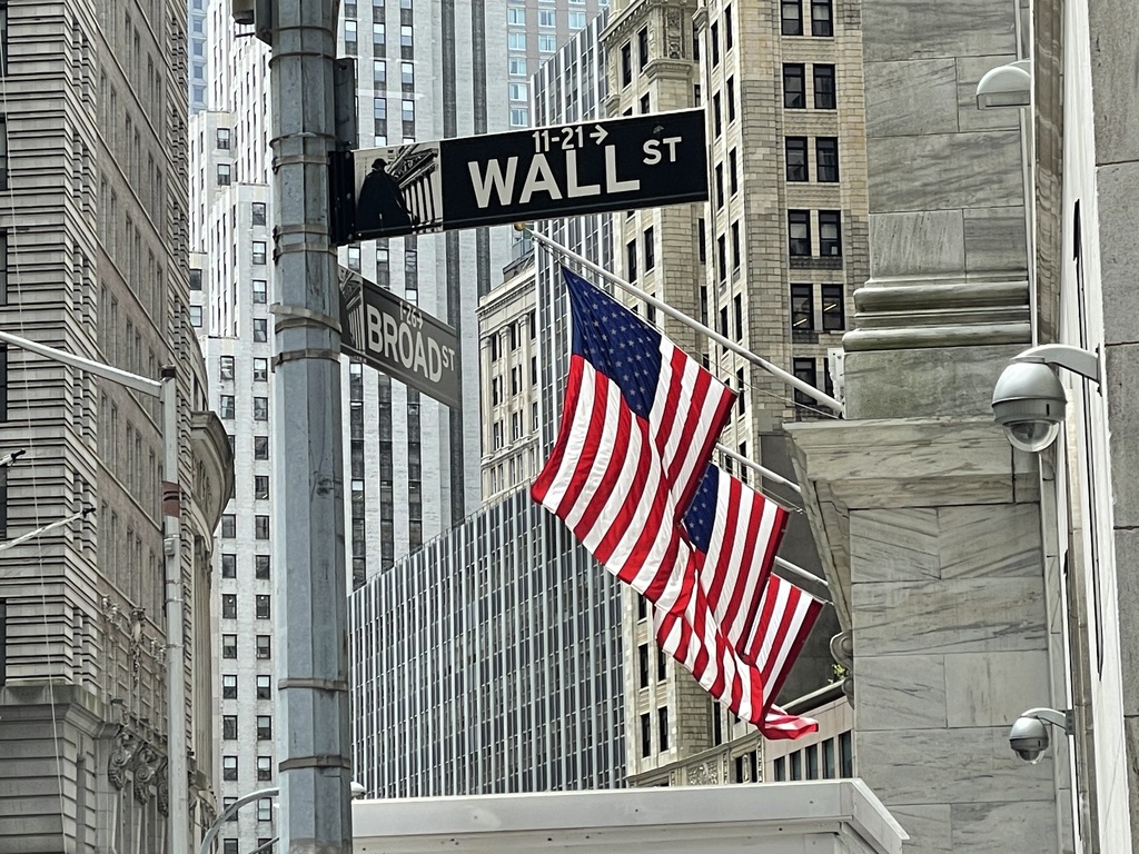 Flags and Wall Street sign