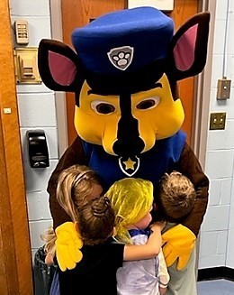 Extended School year students give hug to a special visitor from the PAW Patrol