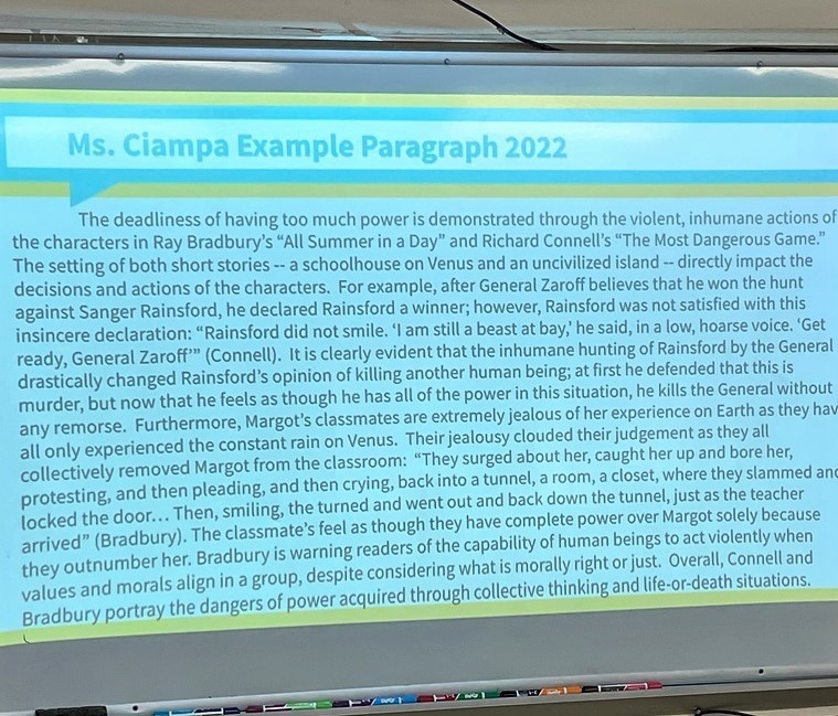 Teacher prompt / example paragraph on screen 