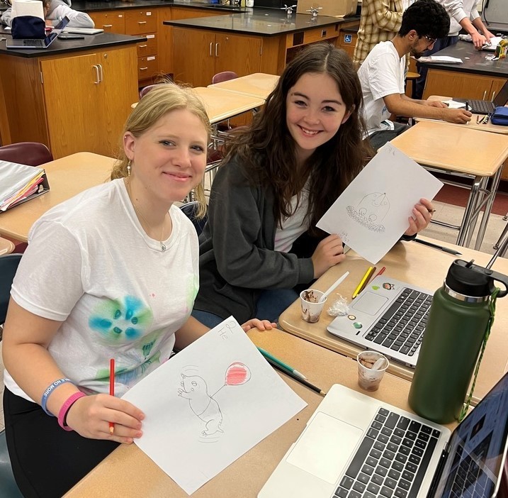 Two WHS chemistry students enjoy Mole Day activities