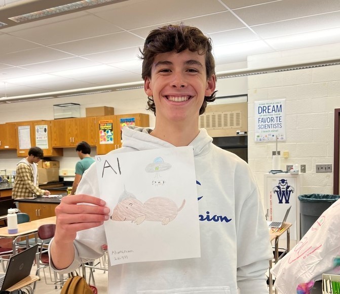 WHS chemistry student shows off Mole Day drawing and calculation