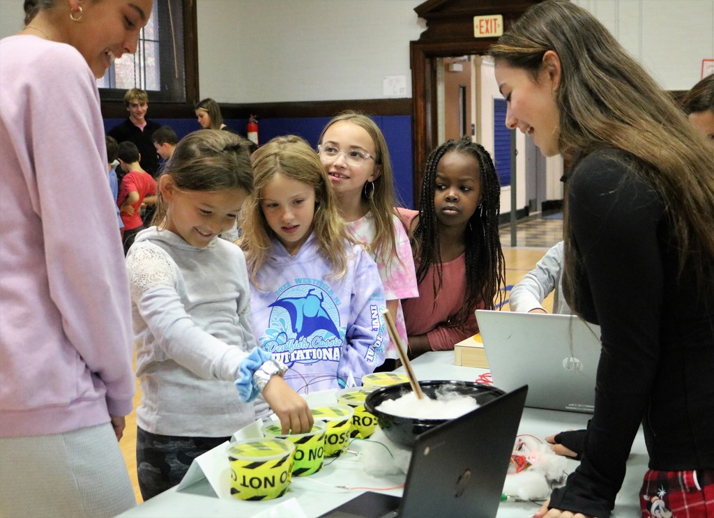 McKinley 3rd graders enjoy hands-on Halloween-themed activity as WHS engineering students look on