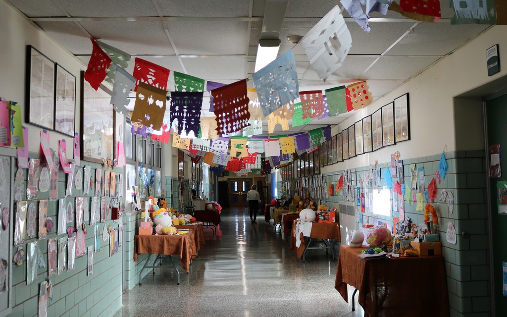 Hallway at Edison Intermediate School with student-created displays marking Dia de los Muertos, or Day of the Dead