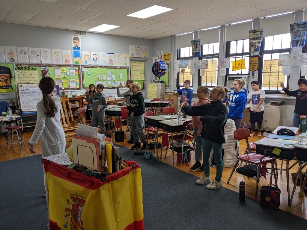 McKinley Spanish teacher and 5th graders dance during lesson