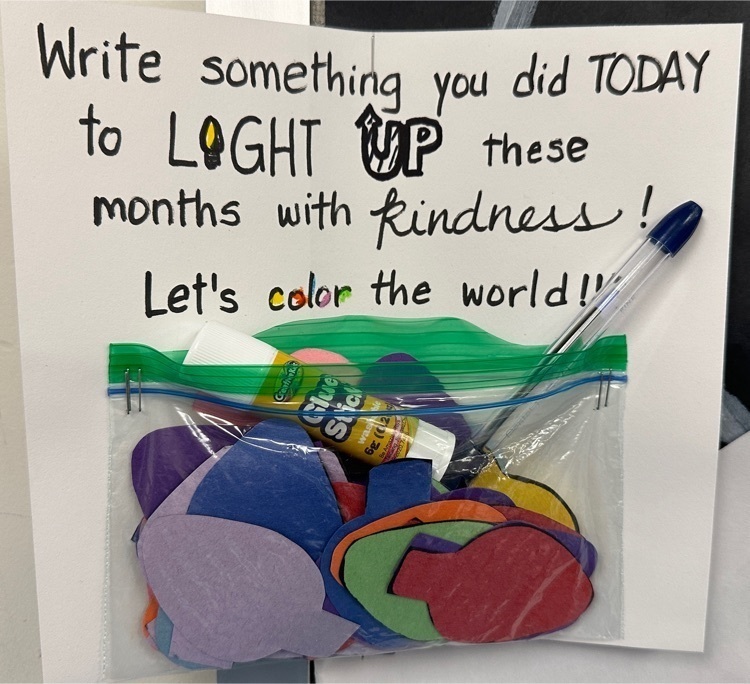 Sign saying "write something you did today to light up these months with kindness."