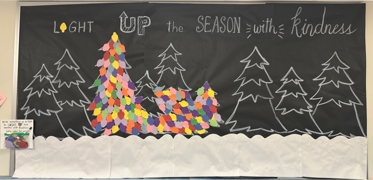 Bulletin Board that says "Light Up the Season with Kindness"