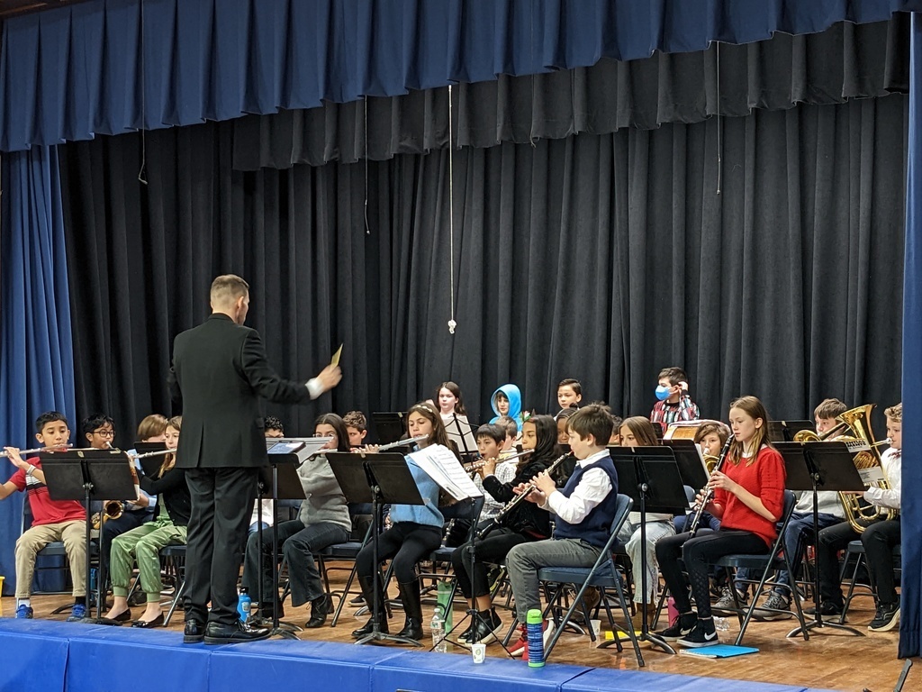 Elementary band director conducts McKinley band concert