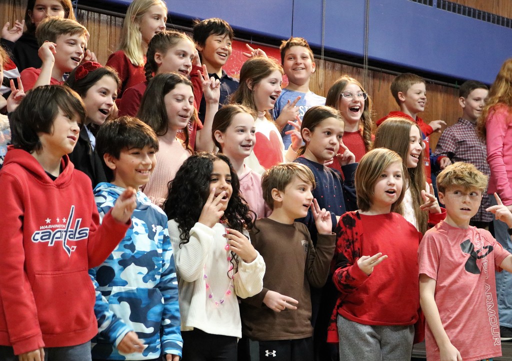 5th graders smile and sing valentine songs