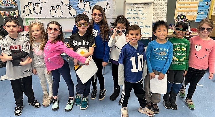 Group of Wilson 1st graders pose for picture during Readers Theater