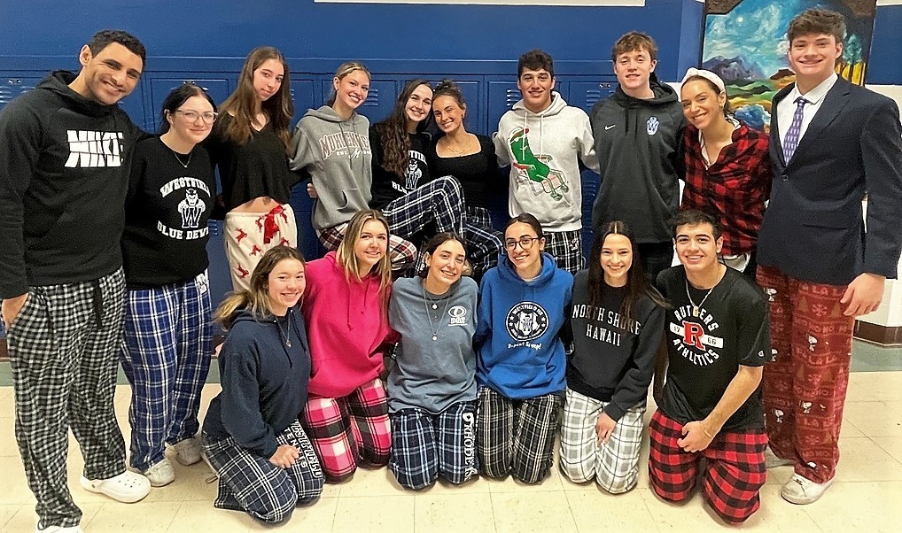 Group photo of students and teachers in pjs on spirit day