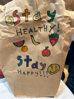 Community service project that says "Stay Healthy, Stay  Happy"