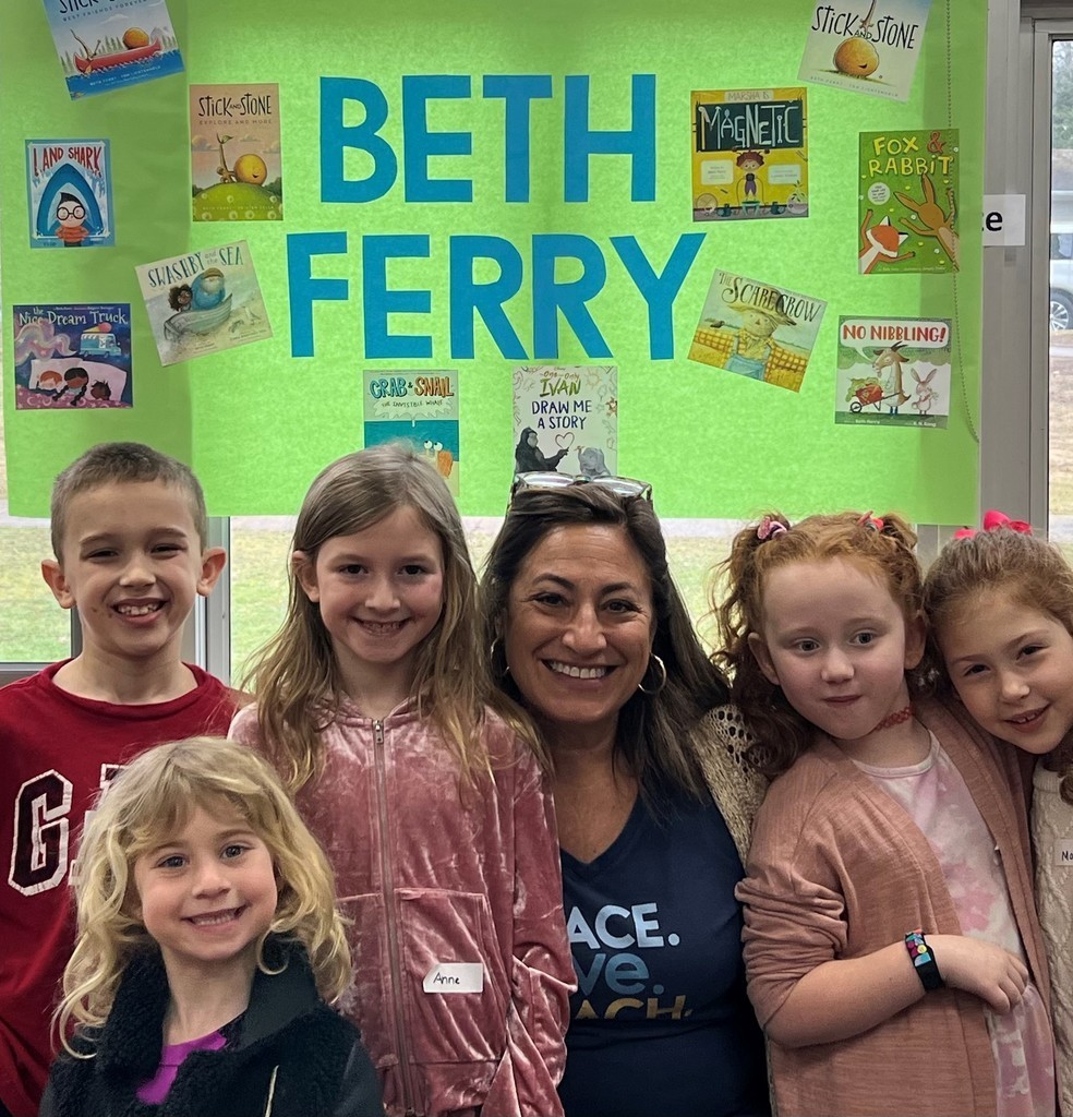 Author Beth Ferry poses with a group of Washington students