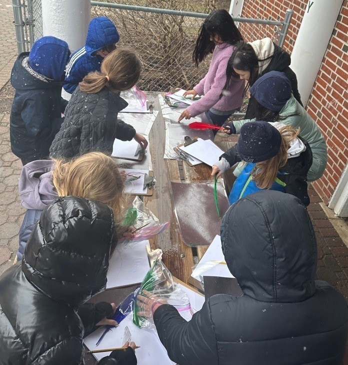 Group of Wilson students study snowflakes