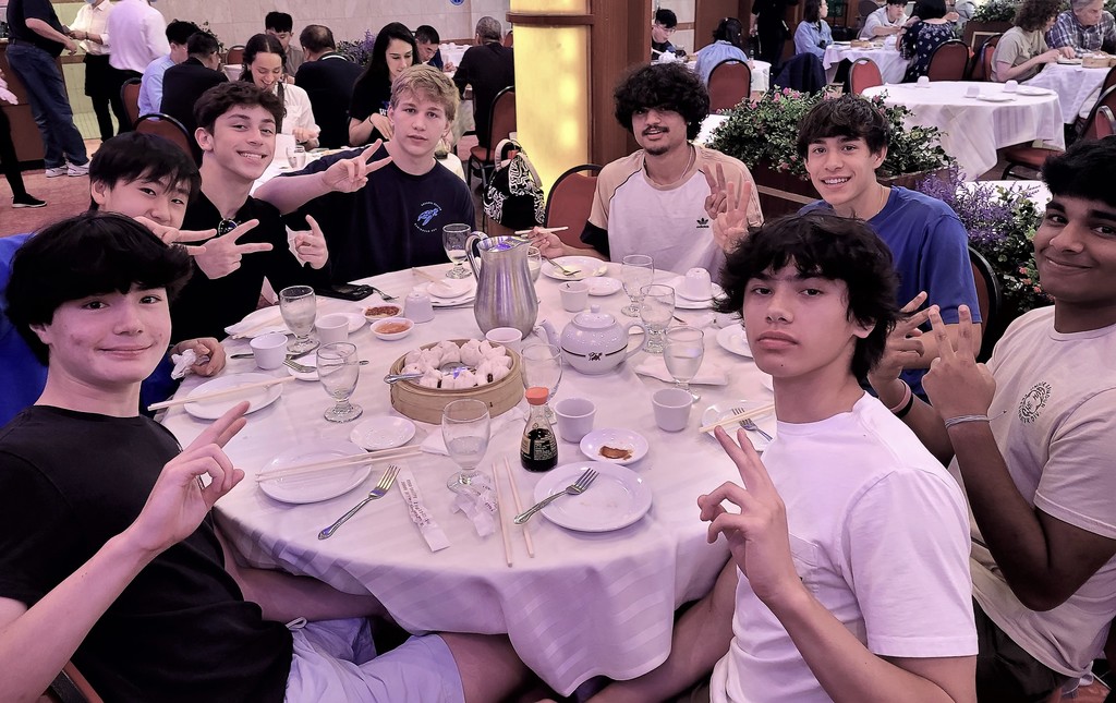 Group of WHS boys enjoying dim sum lunch during Mandarin field trip to NYC