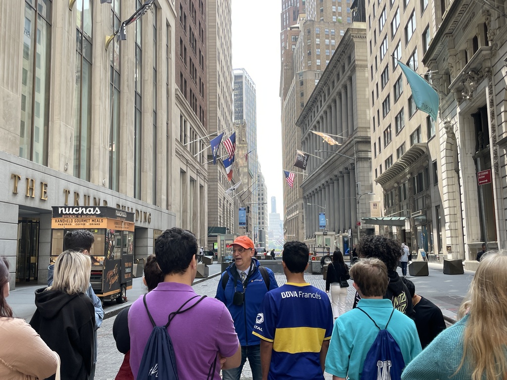 WHS students listen to tour guide during visit to Wall Street