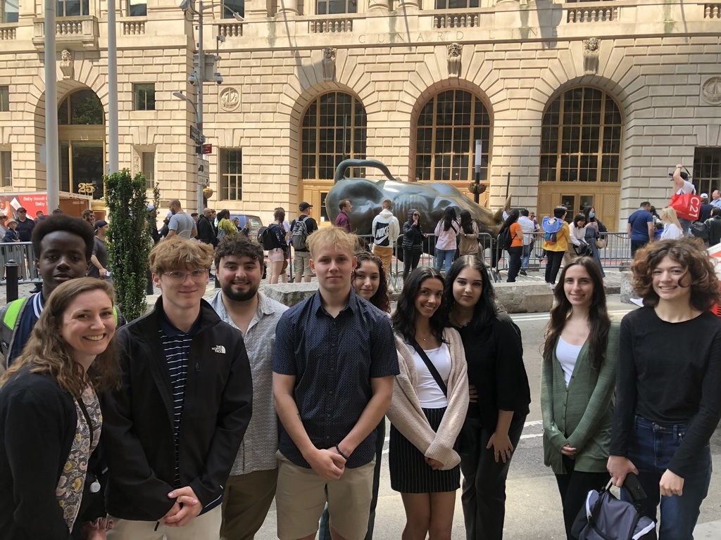 WHS students pose for picture in front of the 'bull' on Wall Street