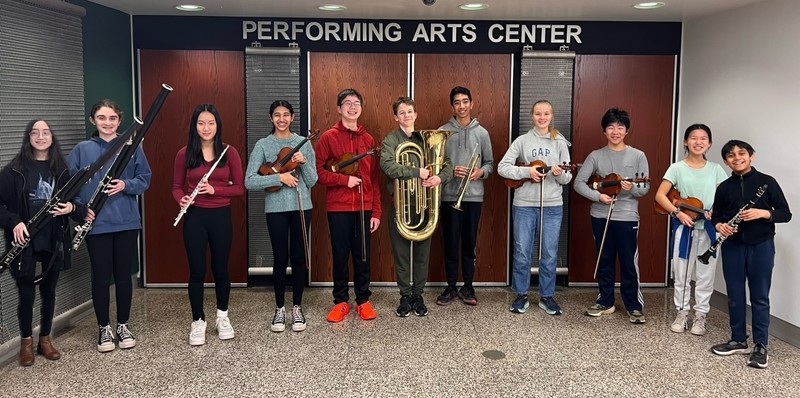 Group photo of Edison student musicians holding instruments
